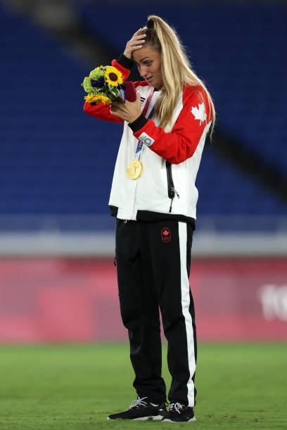 Shelina Zadorsky of Team Canada celebrates with her Gold medal after her teams victory in the Gold Medal Match Women's Football match between Canada...