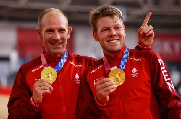 Gold medalists Michael Morkov and Lasse Norman Hansen of Denmark, pose on the podium during the medal ceremony after the Men's Madison final of the...