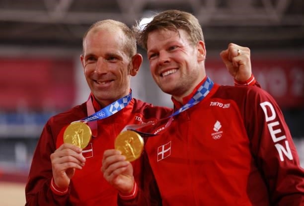 Gold medalists Michael Morkov and Lasse Norman Hansen of Denmark, pose on the podium during the medal ceremony after the Men's Madison final of the...