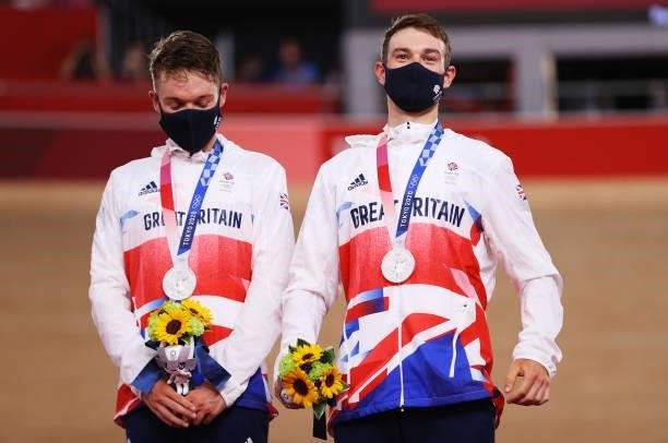 Silver medalists Ethan Hayter and Matthew Walls of Team Great Britain, pose on the podium during the medal ceremony after the Men's Madison final of...