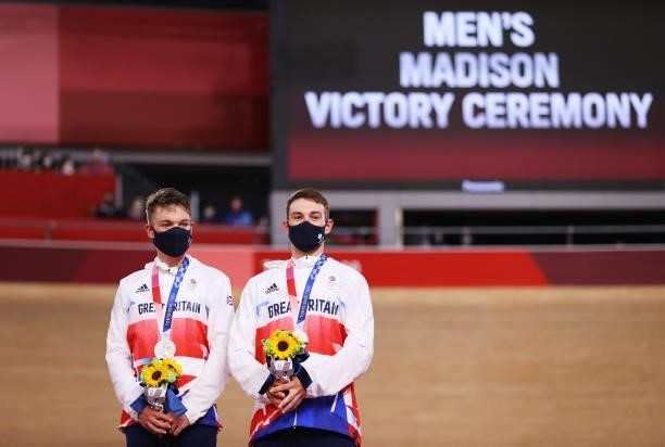 Silver medalists Ethan Hayter and Matthew Walls of Team Great Britain, pose on the podium during the medal ceremony after the Men's Madison final of...