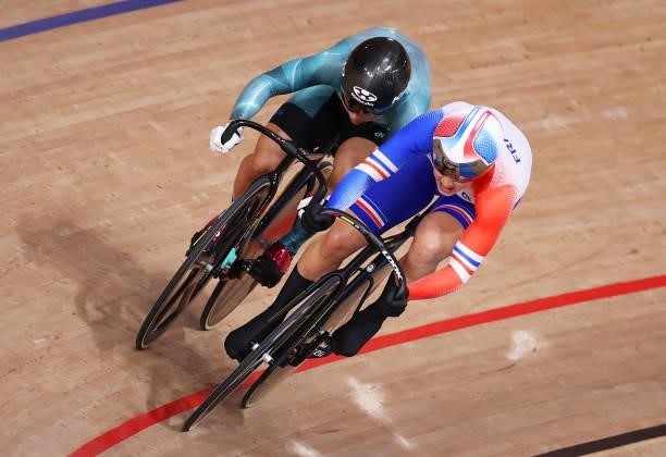 Wai Sze Lee of Team Hong Kong and Mathilde Gros of Team France sprint during the Women's sprint round of 8 finals - heat 4 of the track cycling on...