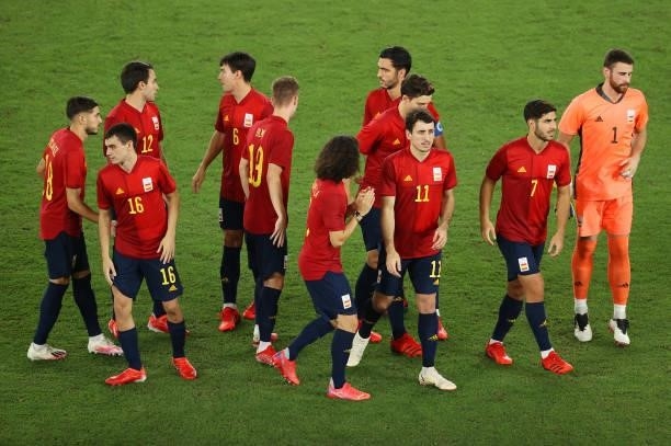 Players of Team Spain react prior to the Men's Gold Medal Match between Brazil and Spain on day fifteen of the Tokyo 2020 Olympic Games at...