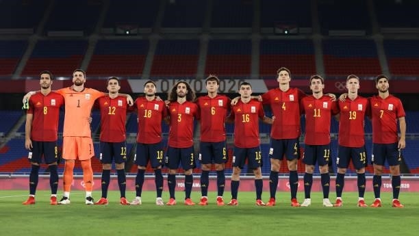 Players of Team Spain stand for the national anthem prior to the Men's Gold Medal Match between Brazil and Spain on day fifteen of the Tokyo 2020...