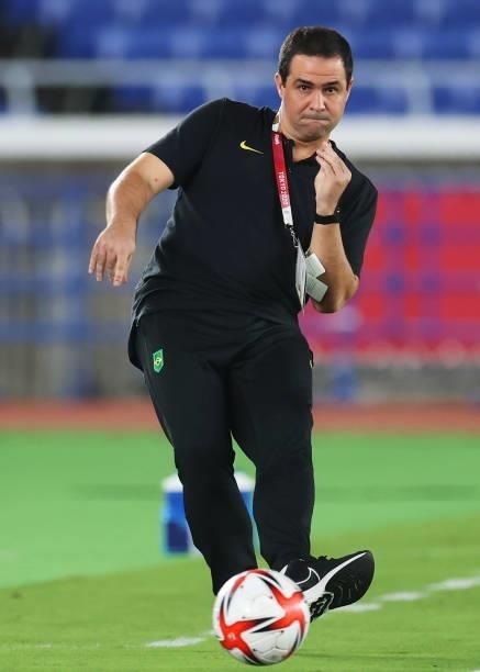 Andre Jardine, Head Coach of Team Brazil makes a pass during the Men's Gold Medal Match between Brazil and Spain on day fifteen of the Tokyo 2020...