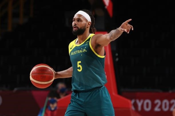 Patty Mills of Team Australia sets up the offense against Team Slovenia during the first half of the Men's Basketball Bronze medal game on day...