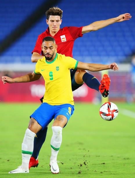 Matheus Cunha of Team Brazil is challenged by Pau Torres of Team Spain during the Men's Gold Medal Match between Brazil and Spain on day fifteen of...