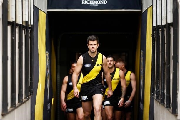 Trent Cotchin of the Tigers leads the Tigers out during the round 21 AFL match between Richmond Tigers and North Melbourne Kangaroos at Melbourne...
