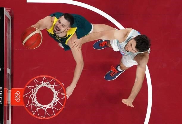 Chris Goulding of Team Australia drives to the basket against Mike Tobey of Team Slovenia during the first half of the Men's Basketball Bronze medal...