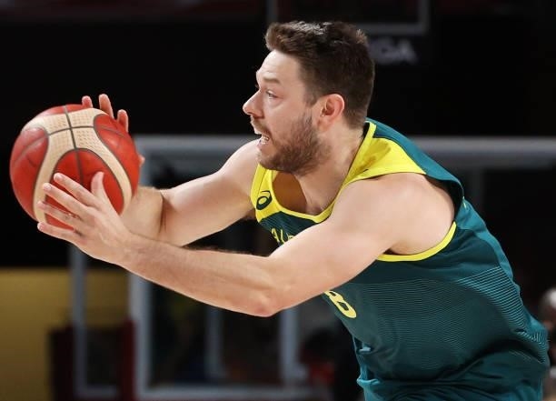 Matthew Dellavedova of Team Australia passes the ball against Team Slovenia during the first half of the Men's Basketball Bronze medal game on day...