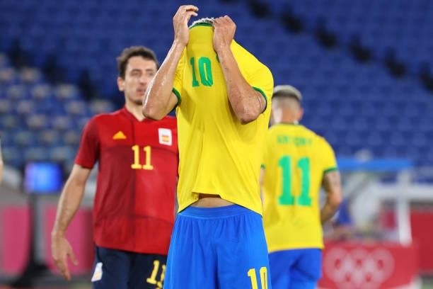 Richarlison of Team Brazil reacts after missing a penalty kick attempt in the first half during the men's gold medal match between Team Brazil and...