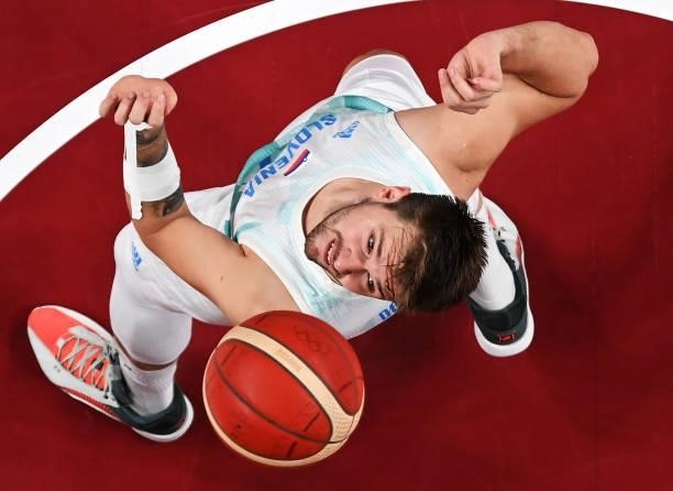 Luka Doncic of Team Slovenia looks for a rebound against Team Australia during the second half of the Men's Basketball Bronze medal game on day...