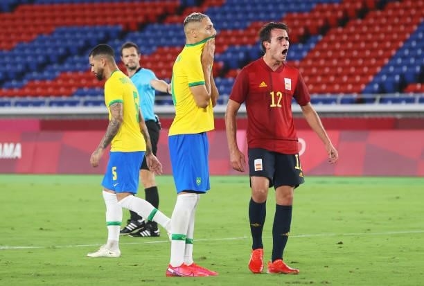 Richarlison of Team Brazil reacts after missing a penalty kick as Eric Garcia of Team Spain celebrates during the Men's Gold Medal Match between...