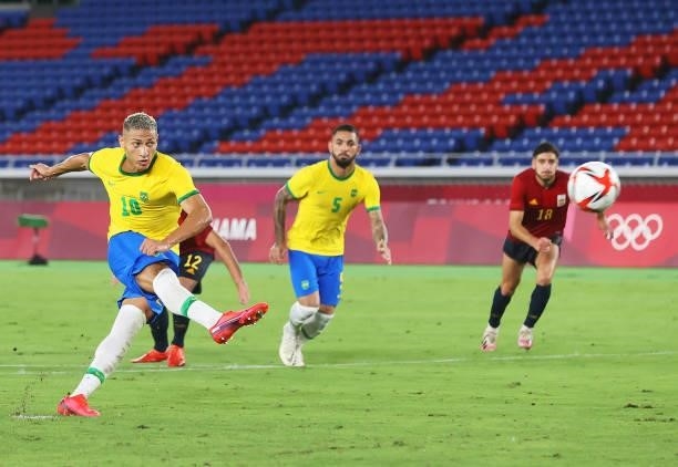 Richarlison of Team Brazil takes a penalty kick and misses during the Men's Gold Medal Match between Brazil and Spain on day fifteen of the Tokyo...