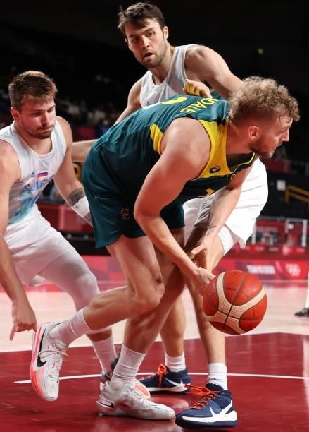 Jock Landale of Team Australia and Luka Doncic of Team Slovenia compete for a loose ball during the second half of the Men's Basketball Bronze medal...