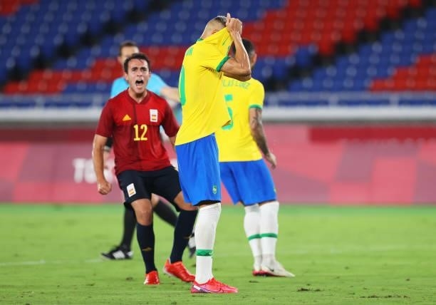 Richarlison of Team Brazil reacts after missing a penalty kick as Eric Garcia of Team Spain celebrates during the Men's Gold Medal Match between...