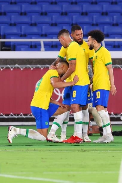 Matheus Cunha of Team Brazil celebrates with teammates after scoring a goal in the first half to take a 1-0 lead during the men's gold medal match...