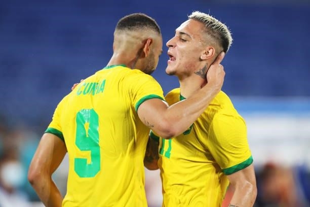 Matheus Cunha of Team Brazil celebrates with Antony after scoring their side's first goal during the Men's Gold Medal Match between Brazil and Spain...