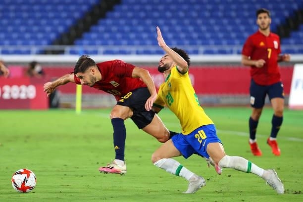 Oscar Gil of Team Spain and Claudinho of Team Brazil battle for possession in the first half during the men's gold medal match between Team Brazil...