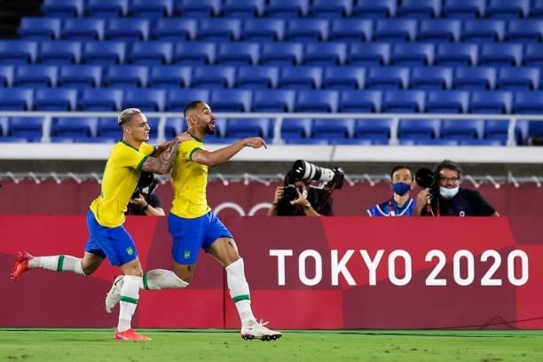 Matheus Cunha of Brazil celebrates his goal with teammates Antony during the Men's Gold Medal Match between Brazil and Spain on day fifteen of the...