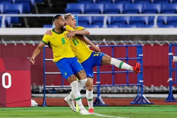 Matheus Cunha of Brazil celebrates his goal with teammates Antony during the Men's Gold Medal Match between Brazil and Spain on day fifteen of the...