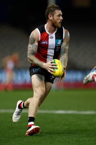 Tim Membrey of the Saints runs with the ball during the round 21 AFL match between St Kilda Saints and Sydney Swans at Marvel Stadium on August 07,...