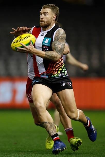Dean Kent of the Saints gathers the ball during the round 21 AFL match between St Kilda Saints and Sydney Swans at Marvel Stadium on August 07, 2021...