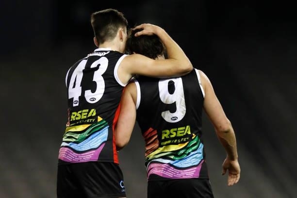 Cooper Sharman acknowledges the hard work of team mate Jack Steele of the Saints during the round 21 AFL match between St Kilda Saints and Sydney...