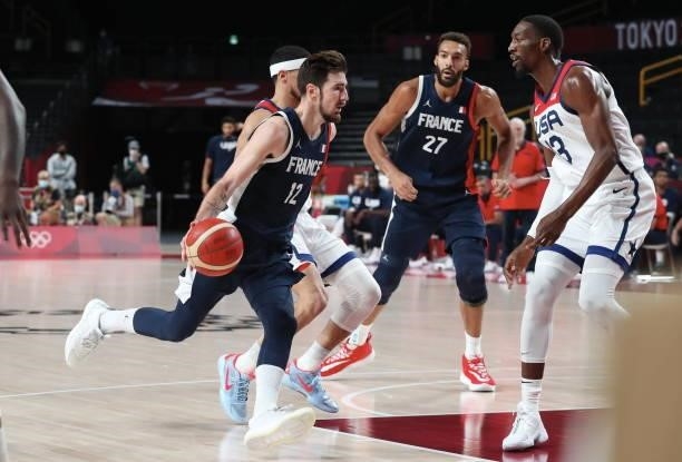Nando De Colo of Team France drives to the basket during the Men's Basketball Finals game between Team United States and Team France on day fifteen...