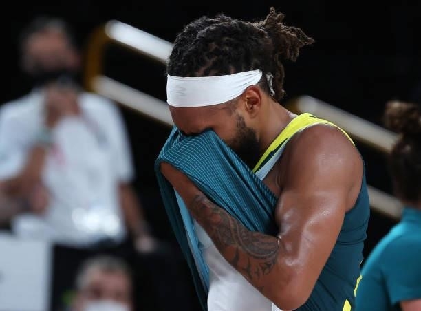 Patty Mills of Team Australia is overcome with emotion after Team Australia's win over Slovenia in the Men's Basketball Bronze medal game on day...