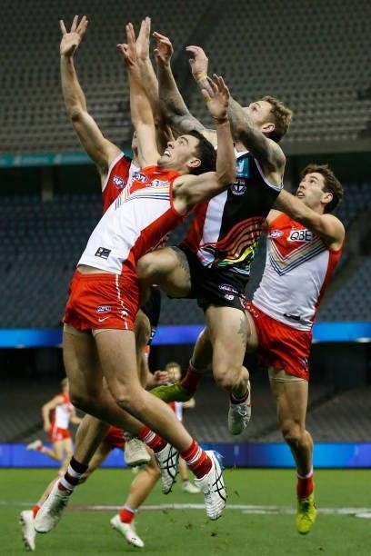 Max King and Tim Membrey of the Saints leap for the ball during the round 21 AFL match between St Kilda Saints and Sydney Swans at Marvel Stadium on...