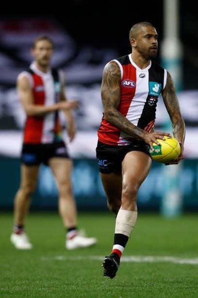 Bradley Hill of the Saints runs with the ball during the round 21 AFL match between St Kilda Saints and Sydney Swans at Marvel Stadium on August 07,...