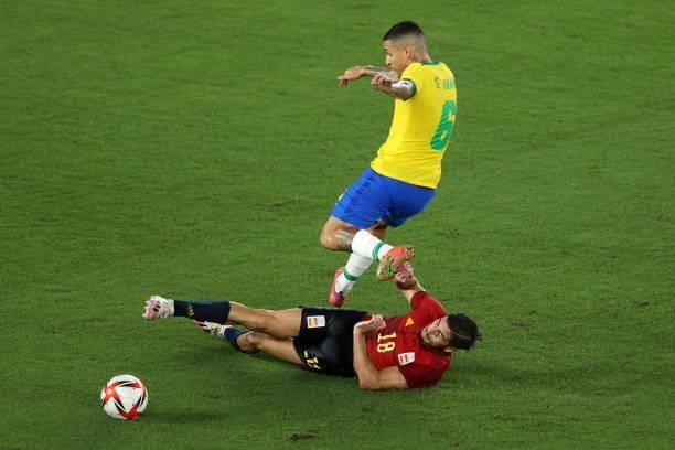 Guilherme Arana of Team Brazil is challenged by Oscar Gil of Team Spain during the Men's Gold Medal Match between Brazil and Spain on day fifteen of...
