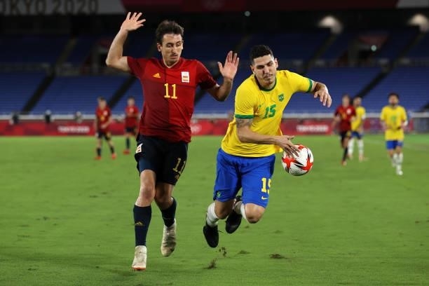 Nino of Team Brazil is challenged by Mikel Oyarzabal of Team Spain during the Men's Gold Medal Match between Brazil and Spain on day fifteen of the...