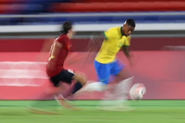 Malcom of Team Brazil runs with the ball during the Men's Gold Medal Match between Brazil and Spain on day fifteen of the Tokyo 2020 Olympic Games at...