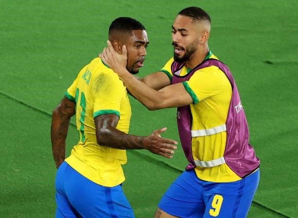 Malcom of Team Brazil celebrates with Matheus Cunha after scoring their side's second goal during the Men's Gold Medal Match between Brazil and Spain...