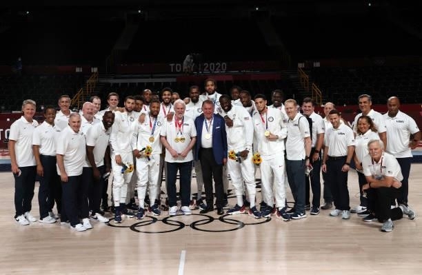 Team United States poses for photographs with their gold medals during the Men's Basketball medal ceremony on day fifteen of the Tokyo 2020 Olympic...