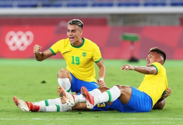 Reinier and Gabriel Menino of Team Brazil celebrate their side's victory after the Men's Gold Medal Match between Brazil and Spain on day fifteen of...