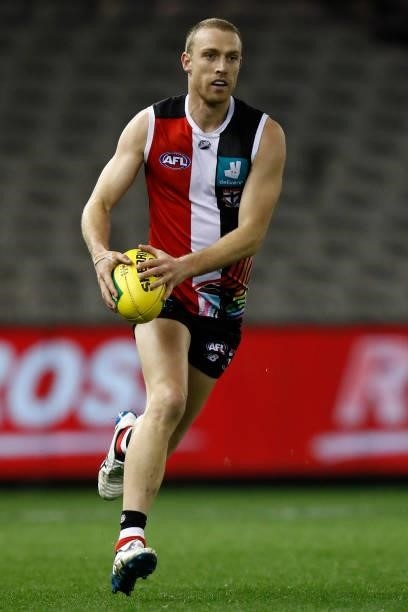 Callum Wilkie of the Saints runs with the ball during the round 21 AFL match between St Kilda Saints and Sydney Swans at Marvel Stadium on August 07,...
