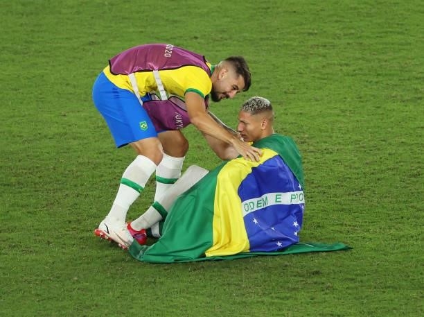 Richarlison of Team Brazil reacts as he celebrates their side's victory with a team mate after the Men's Gold Medal Match between Brazil and Spain on...