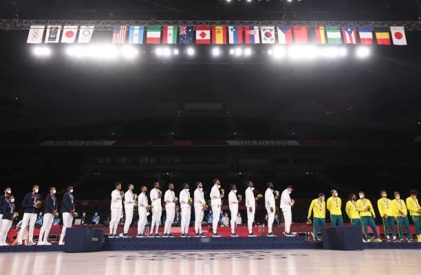 Team United States stands atop the medal stand for the National Anthem during the Men's Basketball medal ceremony on day fifteen of the Tokyo 2020...