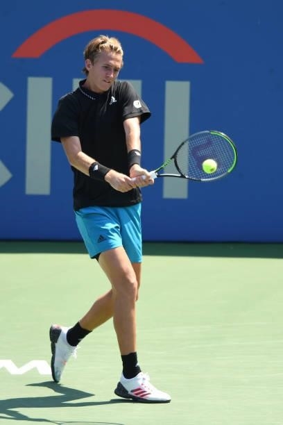 Sebastian Korda of the United States reacts to a shot during a match against Jannik Sinner of Italy on Day 6 during the Citi Open at Rock Creek...