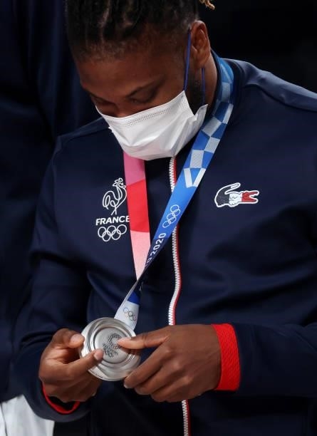 Guerschon Yabusele of Team France examines his silver medal during the Men's Basketball medal ceremony on day fifteen of the Tokyo 2020 Olympic Games...