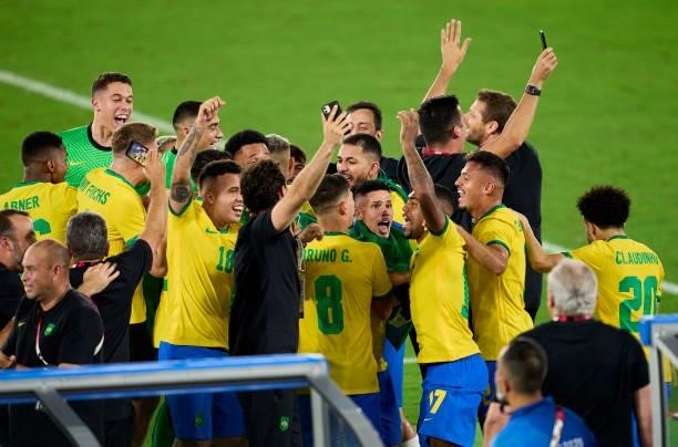 Players of Team Brazil celebrates their side's victory after the Men's Gold Medal Match between Team Brazil and Team Spain on day fifteen of the...