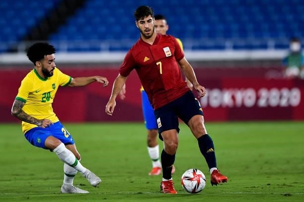 Claudinho of Brazil and Marco Asensio of Spain during the Tokyo 2020 Olympic Mens Football Tournament Gold Medal Match between Brazil and Spain at...