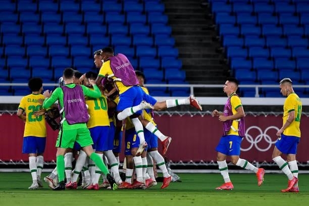 Matheus Cunha of Brazil celebrates after scoring his sides first goal with his team mates during the Tokyo 2020 Olympic Mens Football Tournament Gold...