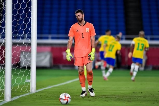 Unai Simon of Spain looks dejected after conceding his sides first goal during the Tokyo 2020 Olympic Mens Football Tournament Gold Medal Match...