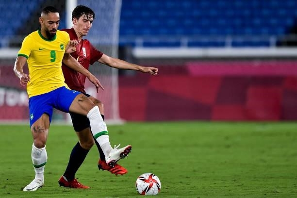 Matheus Cunha of Brazil and Pau Torres of Spain during the Tokyo 2020 Olympic Mens Football Tournament Gold Medal Match between Brazil and Spain at...