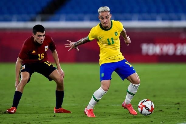 Pedri of Spain and Antony of Brazil during the Tokyo 2020 Olympic Mens Football Tournament Gold Medal Match between Brazil and Spain at International...