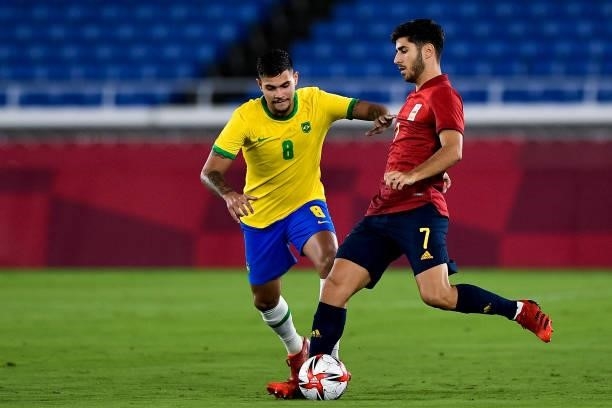 Bruno Guimaraes of Brazil and Marco Asensio of Spain during the Tokyo 2020 Olympic Mens Football Tournament Gold Medal Match between Brazil and Spain...